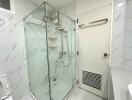 Modern bathroom with glass shower enclosure