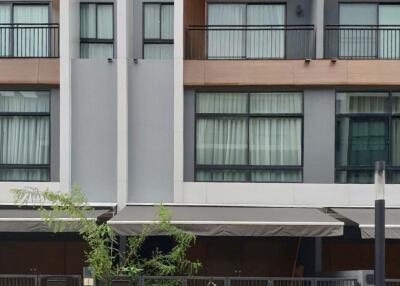 Front view of residential building with balconies