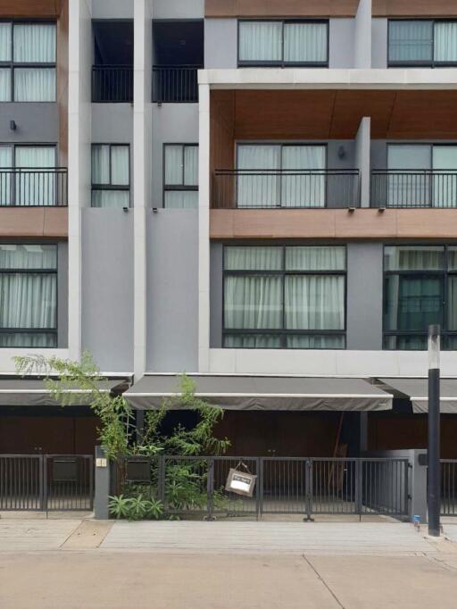 Front view of residential building with balconies