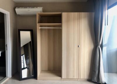 Bedroom with wardrobe and mirror