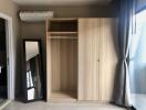 Bedroom with wardrobe and mirror