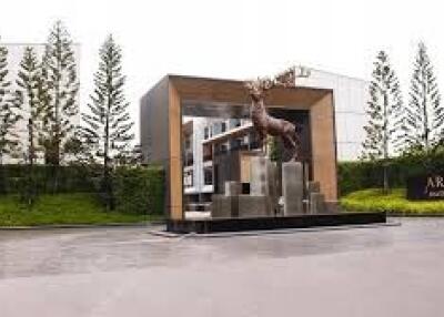 Modern building entrance with deer sculpture