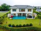 Exterior view of a modern house with a pool