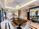 Elegant dining area with a luxurious chandelier and large dining table