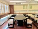 Spacious dining room with a large table and eight chairs