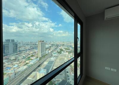 City view from the window of an upper floor apartment