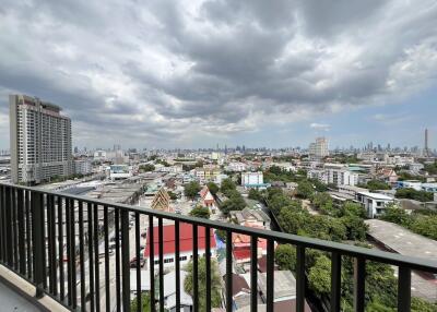 view from apartment balcony overlooking the city skyline