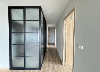 modern hallway with sliding glass door