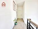 Bright hallway with a plant and modern decor