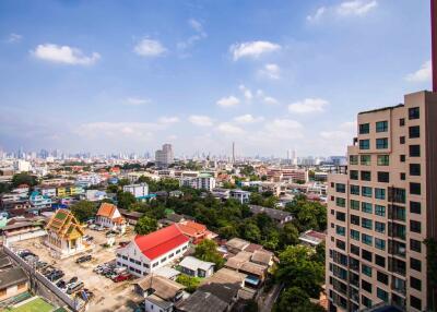 View of a cityscape with buildings and clear sky