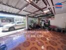 Garage space with tiled floor and storage area