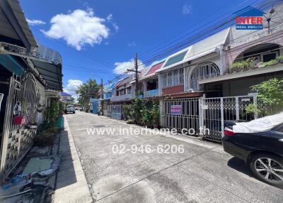 Street view of residential area with colorful townhouses