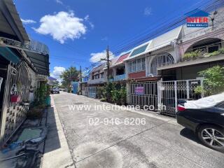 Street view of residential area with colorful townhouses