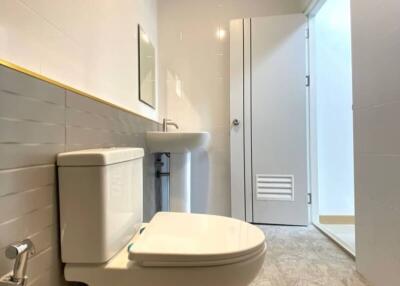 Modern bathroom with toilet and sink