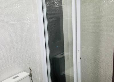 Modern bathroom with shower and toilet