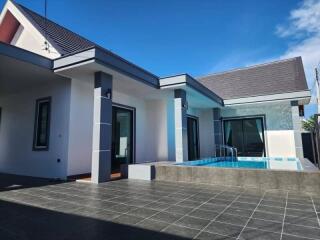 Modern exterior view of a house with pool