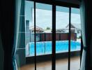 Living room with view of the swimming pool