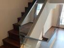 Modern staircase with glass railing