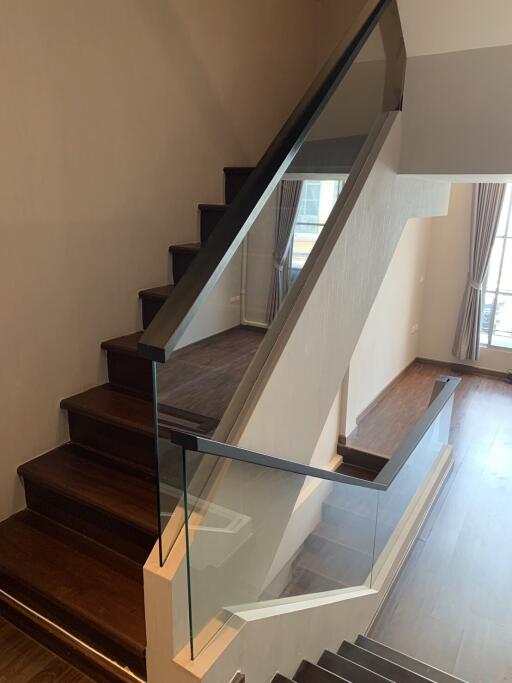 Modern staircase with glass railing