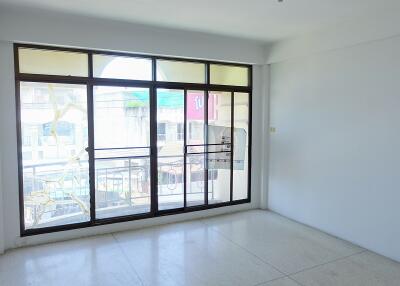 Empty living room with large window