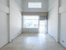 Empty commercial space with large front windows