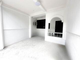 Main living space with white interiors