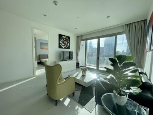 Modern living room with large window and city view