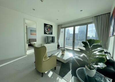 Modern living room with large windows and city view