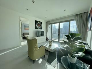 Modern living room with large windows and city view