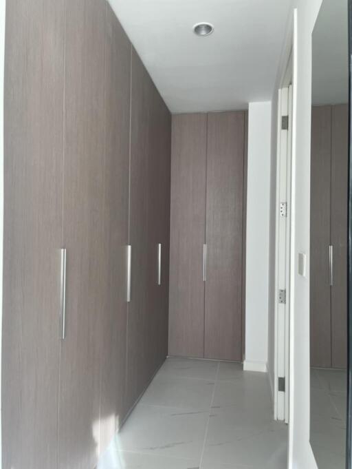 Spacious hallway with built-in closets