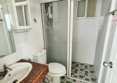 Bathroom with modern shower and tiled floor