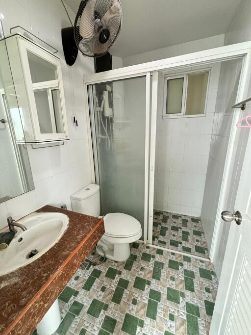 Bathroom with modern shower and tiled floor