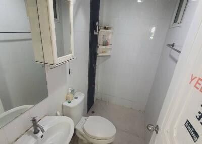 A small clean bathroom with basic amenities