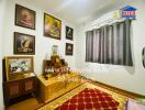 Bedroom with decorated walls and air conditioning