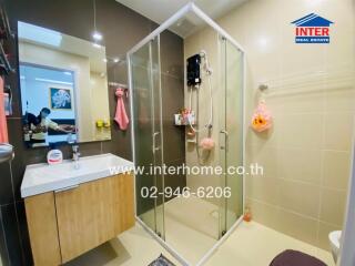 Modern bathroom with shower and vanity