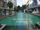 Outdoor view of a residential building with a pool