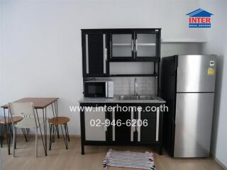 Modern kitchen with table and chairs