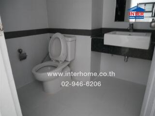 Modern bathroom with toilet and sink