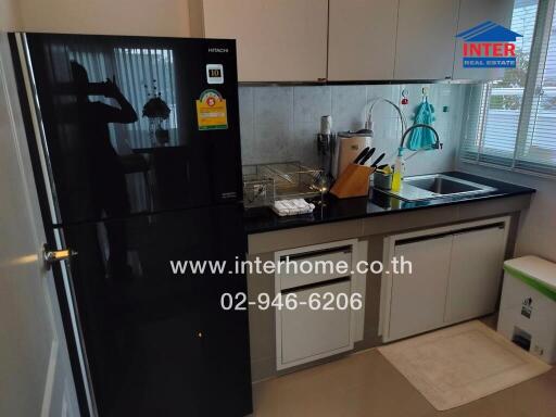 Modern kitchen with appliances and sink