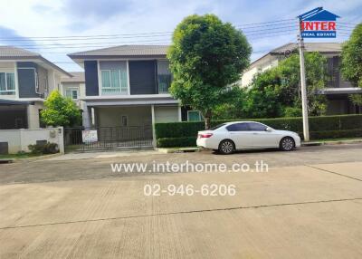 Modern suburban house with car parked outside