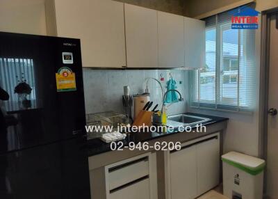 Modern kitchen with appliances and sink