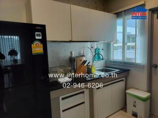 Modern kitchen with appliances and sink