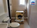 Laundry room with washing machine and toilet