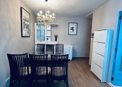 Dining room with chandelier and table with chairs