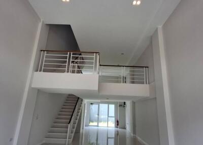 Modern two-story living space with high ceiling