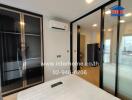 Modern bedroom with sliding glass door and air conditioning