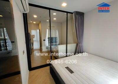 Bedroom with glass door and balcony view