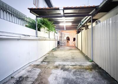 Outdoor parking space with carport