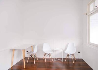 Minimalist modern corner with chairs and wooden floor