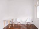 Minimalist modern corner with chairs and wooden floor